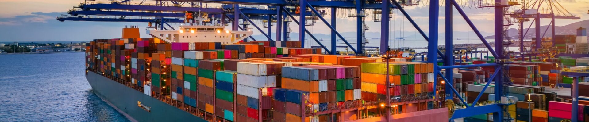 A,Large,Container,Cargo,Ship,Is,Beeing,Loaded,In,A